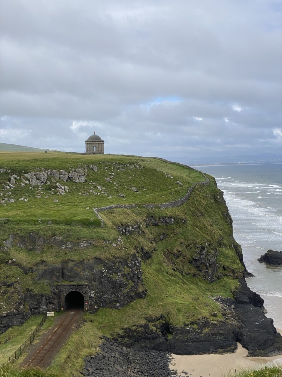 Mussenden Temple with the railway tunnel beneath it