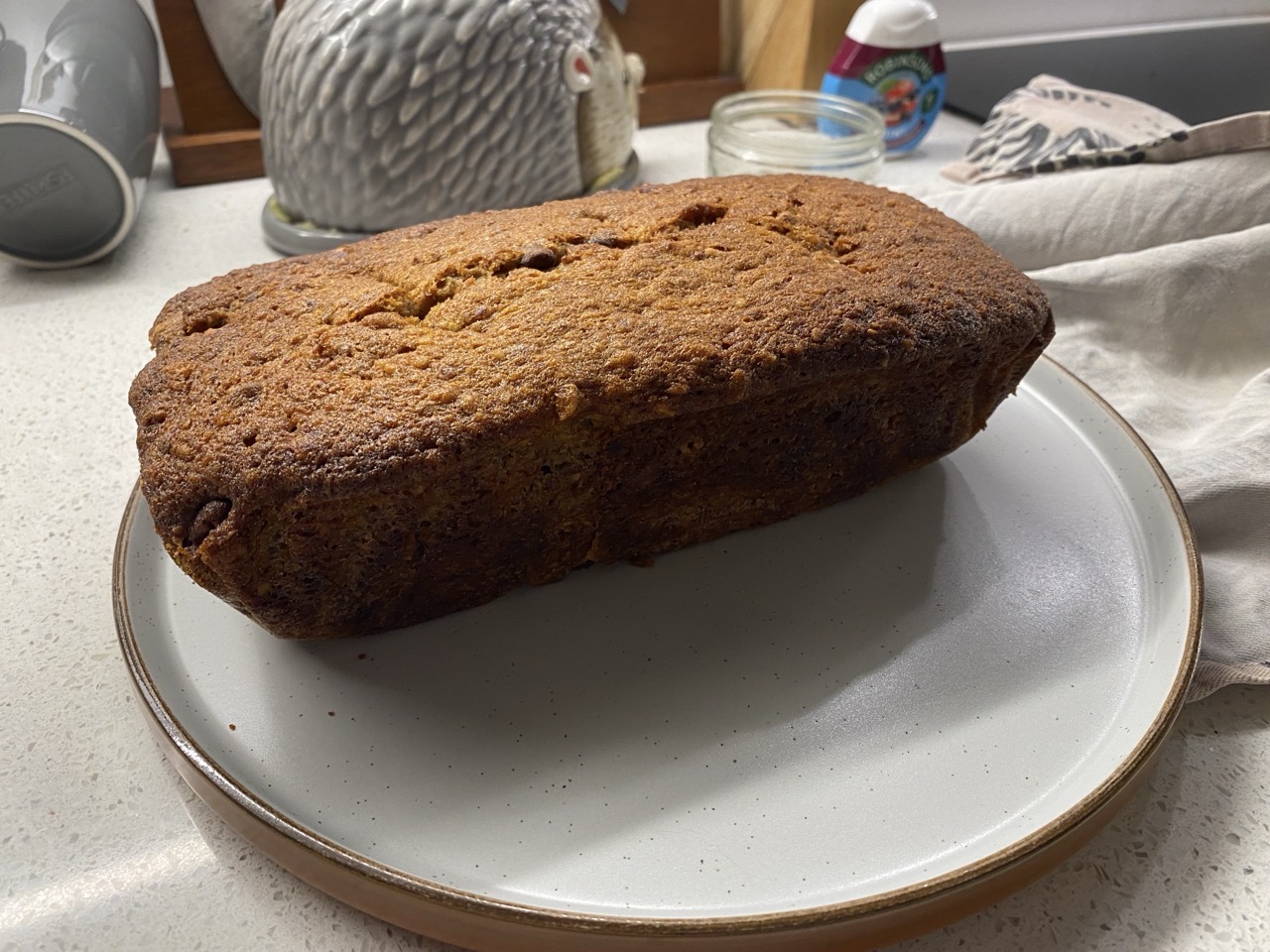 It’s some banana bread on a plate. It is beautiful.