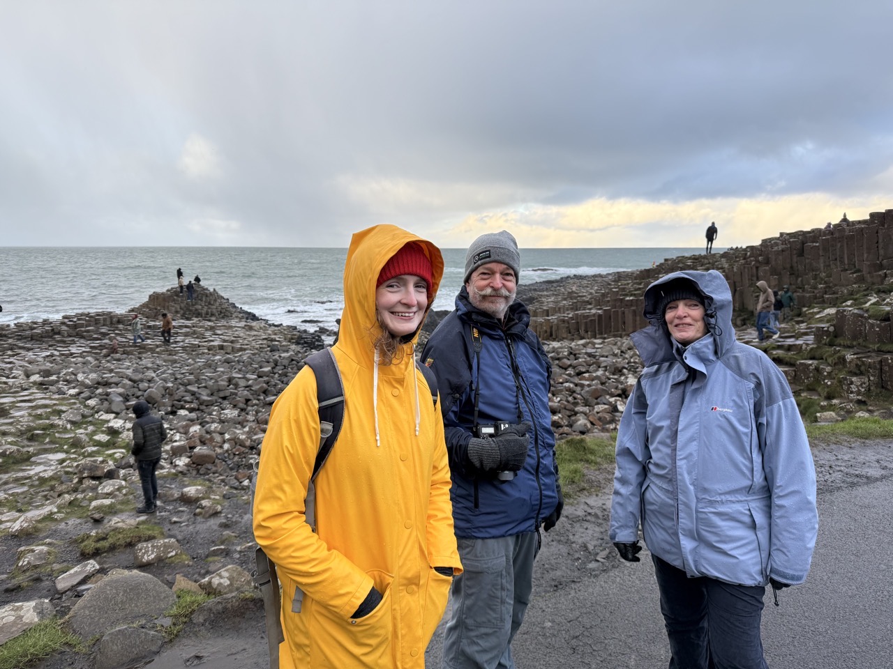 Lucy and her parents at the Giant’s Causeway.