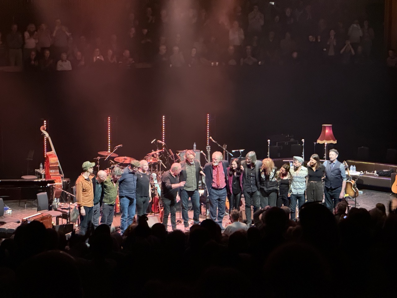 The musicians doing their bows at the front of the stage